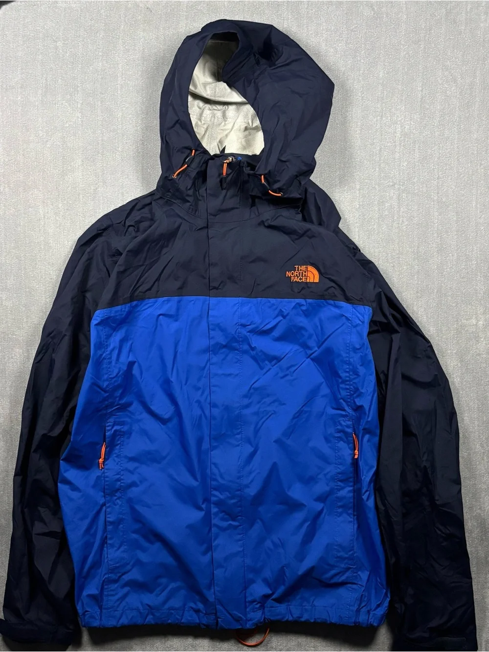 The North Face Navy & Royal Blue Hooded Rain Shell with Orange Accents